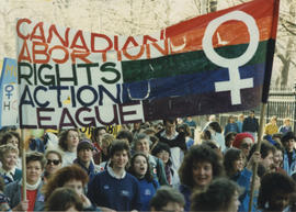 Participants carrying a "Canadian Abortion Rights Action League" banner during the 1987 Toronto I...
