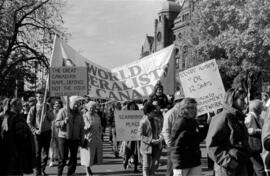 Protestors holding TDN signs in front of the Ontario Legislative Building. Toronto, 1988