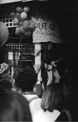 Guitarist performs for  a crowd. Toronto, 1988.
