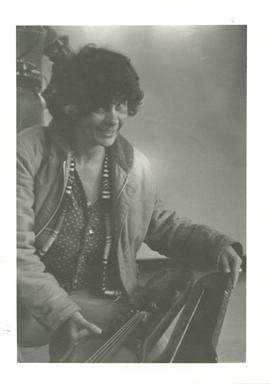 Woman showing a violin in its case
