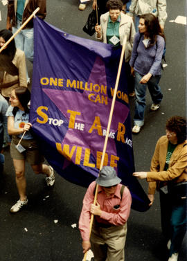 Group holding Stop the arms race banner at UNSSOD (United Nations Second Special Session on Disar...