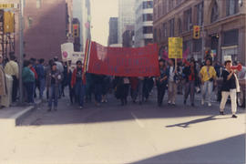 Front view of participants carrying a "Aboriginal Women, the Strength of Nations" banner during t...
