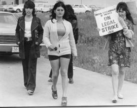 Four women from United Steelworkers of America carrying "United Steelworkers of America on legal ...