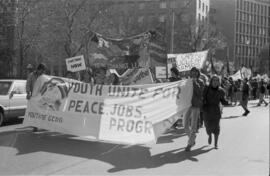 Protestors holding Youth Group signs. Toronto. 1988.